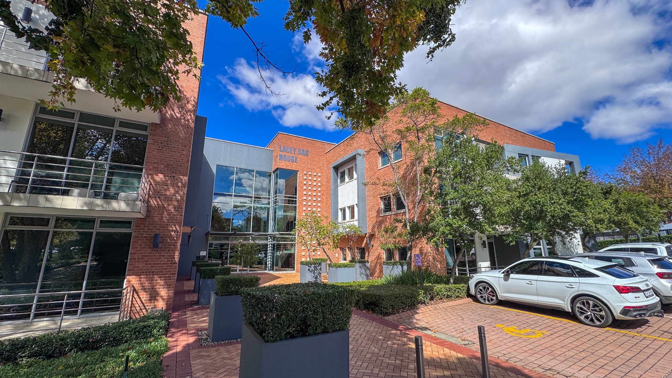 Turnkey 395m2 Ground-Floor Fitted Suite with Multi-Boardroom & Patios | Ballyclare Drive, Bryanston