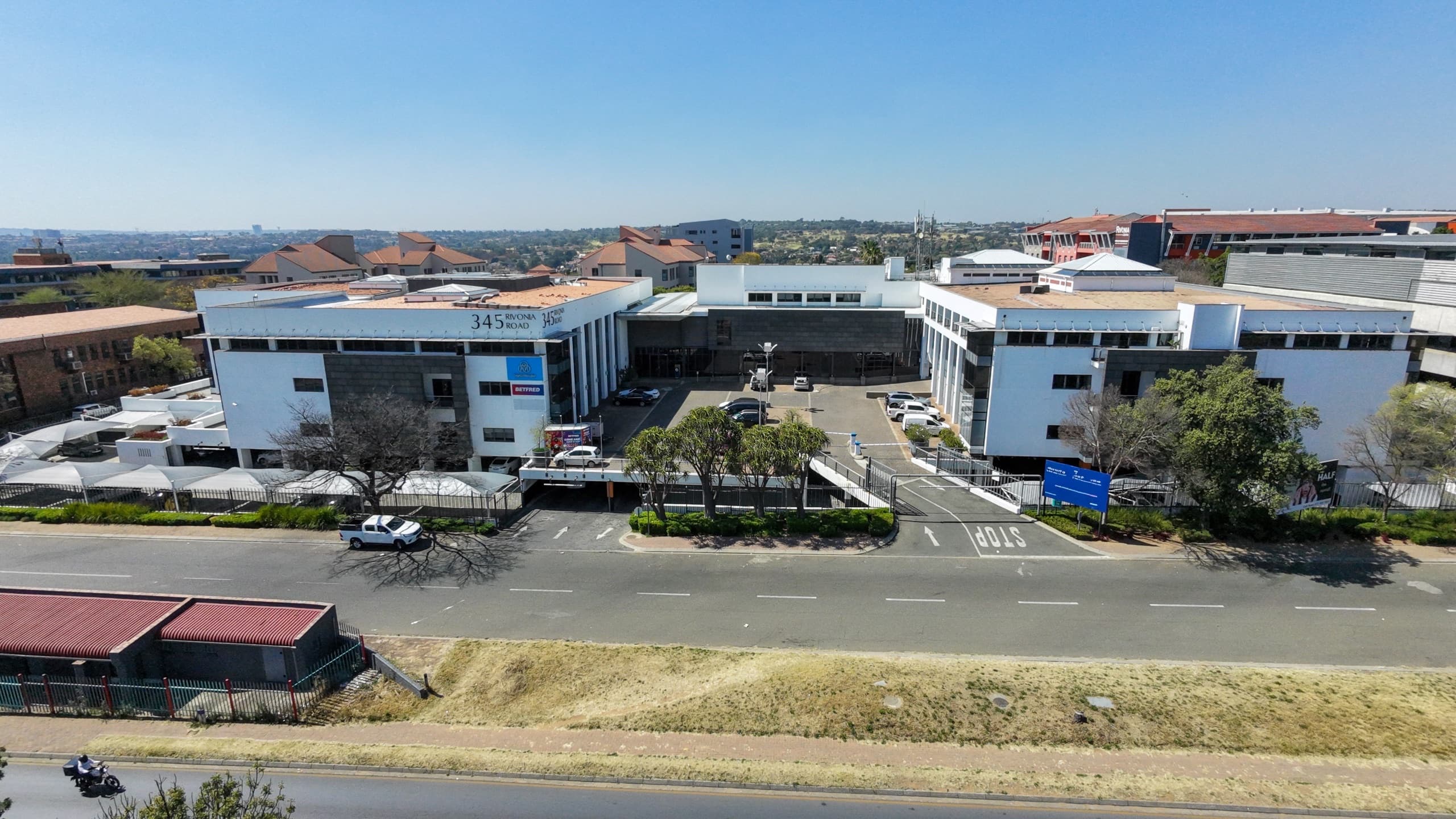 Turnkey 327m2 Ground-Floor Fitted Suite with Private Balcony | 345 Rivonia, Rivonia